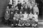 1929 Great Ellingham School
Carol Ewin Collection. Back Row: ? John Fordham, Kenneth Wigby, John Canham, Ralph Wigby, Eric Fuller
Third Row: Cyril Hinkings, Leonard Roy Clarke, Joan Wilkins, Mary Pollard, Dorothy Pease, Vera Catling, ?
Second Row: Dora Hudson, Joy Lee, Ada Saunders, Daphne Chapman, Georgina Newby, Ethel Edwards, Marjorie Skitmore
Front Row: Jimmy Collins, Alec Stubbings, Bernard Middleton, Ernie Fincham. Identification by L R Clarke provided to Attleborough Heritage Group