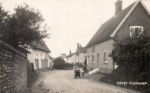 Church Street also known as The Street. Islay House on the right. Ye Olde Thatche Shoppe on left and the Crown in the background. Postcard Carol Ewin