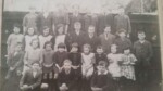 Rocklands School. Believed to be 1928. Reading left to right. Back row: Dorothy Skipmore, Irene? Webster, Unknown, ? Woods, ? Woods, Leslie Banham, Unknown.
Middle row: Margaret Skipmore, ? Webster, ? Ayers, Sybil Banham,Ben Hutson, Charlie Algar, Arthur Fisher, Norman Goddard, Arthur Webster.
Front row: Stanley Fisher, Marjory Goddard, Peggy Goddard, ?Maud Skitmore, ? Ayres, Ethel Webster, Jack Skitmore, Ethel Banham, ?Maud Skitmore's sister.
Kneeling: Cyril Algar, Alan Hutson, Billy Banham.
Jack Reynolds and Leonard Houchen are believed to be in the photograph. Photograph Alan Gardiner