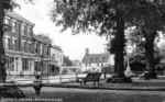 Queens Square. Esso garage in the background. Postcard BCV