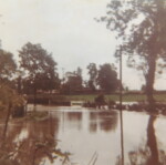 1968 Flooding. Photograph taken in Long Street not far from the junction with West Carr Road. Corner Farm in the background. Courtesy of Christine Bell and Steve Southcott
