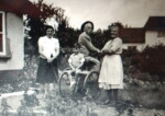 Ernie Kemp with mother and grandparents, Jonathan & Minnie Kemp at 'Dunromin', Long Street. 1949-1950. Photograph courtesy of Ernie Kemp