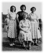 Lilian Clarke (seated) with daughters from left to right Joan, Elvina & Peggy. Lilian Clarke once lived in a cottage at Currier's Farm on the Watton Road, Great Ellingham. Photograph courtesy of Gerry Speck