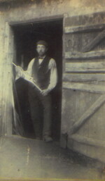Herbert Lebbell at Town Green Smithy door c.1910. Photograph courtesy of Susan Fay