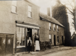 Raymond Neave (centre) with his father Joe (right) and possibly Ray's step-sister Mary (left) outside their Supply Stores. Courtesy Cindy & David Dove