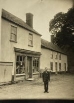 Raymond Neave outside his father's supply stores 'H J Neave' above the door. c.1927. Courtesy Cindy & David Dove