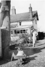 Sheila Skipper at the rear of Wayside, Attleborough Road. 1959. Courtesy Jane Brand