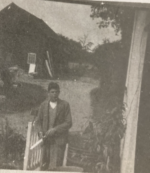Young Paul Hawkins at the gate of the property now Chequer Cottage. Barn across the road opposite the Post Office. Courtesy Paul Hawkins
