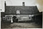 The Chequers. The board over the doorway refers to the licensee, Jacob Beales. Assumed to be in the photograph is Jacob Beales (centre) and Isabella. Courtesy Linda Purdy