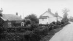 Long Street. Left the former Day School (near the Manse) & right two pairs of double cottages. Courtesy Georgina Wing